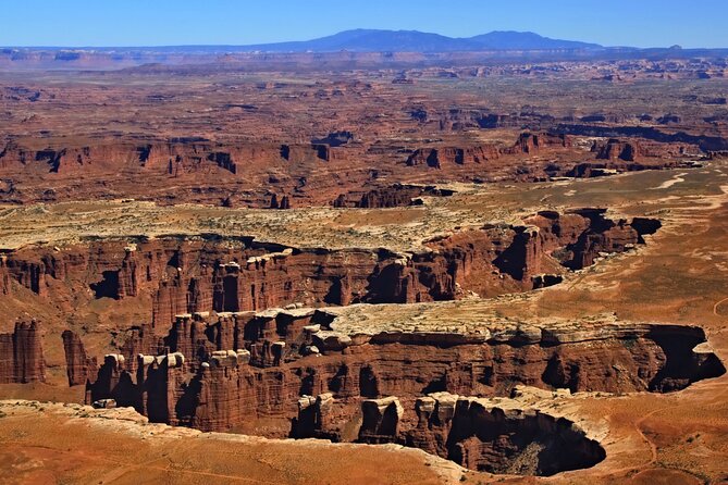 Canyonlands National Park Airplane Tour - Corona Arch Near Moab: Spotting a Natural Bowtie-Style Moment