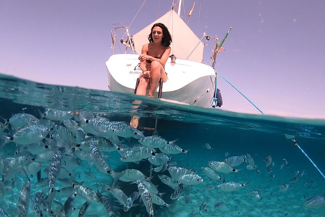 Catamaran excursions in the Asinara island National park - Meet the crew: Captain Giovanni’s style