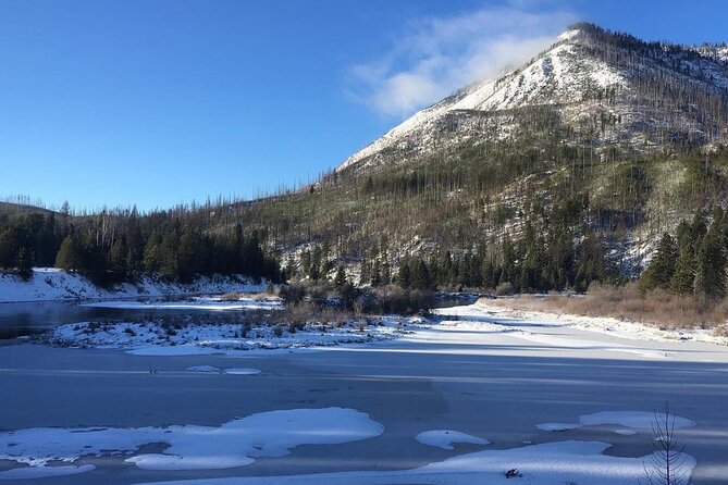 Combo: Scenic Drive & 2hr Snowshoeing Tour in Glacier National Park - Lake McDonald Lodge and rainbow rocks: a classic Glacier moment in winter light