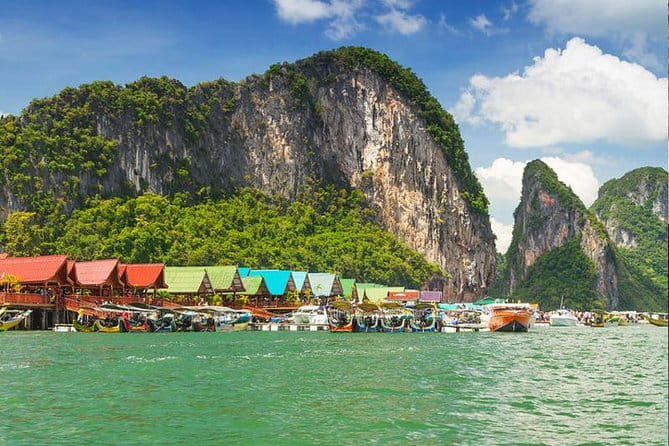 Exploring Phang Nga Bay national park with Lunch and Dinner - Stop 2: Koh Panak Cave swim time with slide, mats, and paddle boards