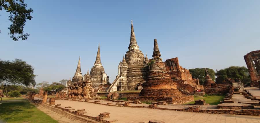 From Bangkok: Ayutthaya & Khao Yai National Park Day Trip - Wat Phra Si Sanphet and Wihan Phra Mongkhon Bophit: royal-era Ayutthaya power