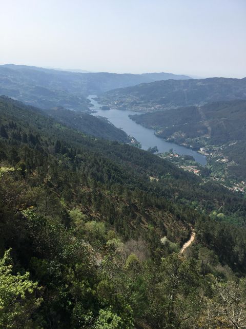 Gerês National Park Waterfalls and wolf village in 4x4 - The Pedra Bela viewpoint picnic: snacks, green wine, Port