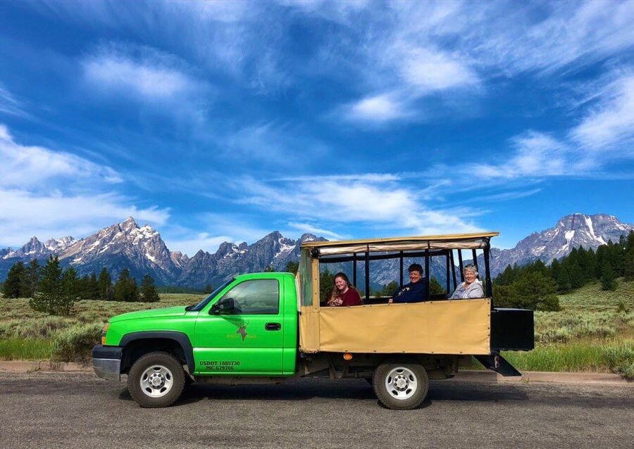 Jackson: Grand Teton National Park Guided Wildlife Tour - Your safari ride: open-air summer viewing vs heated winter comfort