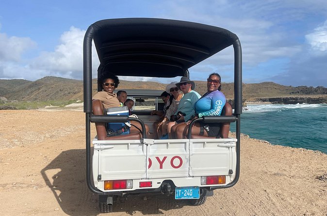 Jeep Tour Arikok National Park and Snorkeling at Baby Beach - Fontein Cave and Quadirikiri Cave: art, sunlight, and a fish pedicure