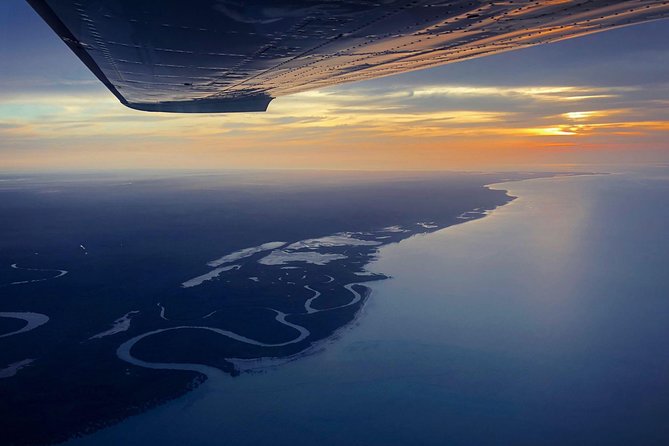 Kakadu National Park Scenic Flight &Yellow Water Cruise - Yellow Water boat cruise: wildlife, water systems, and spiritual meaning