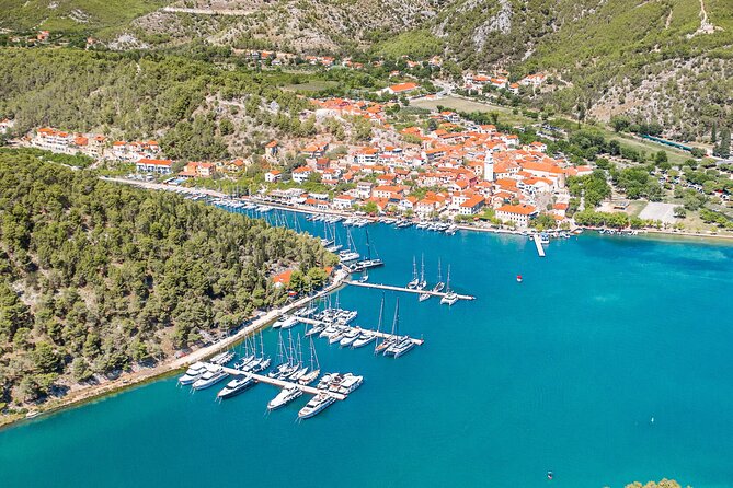 Krka National Park Tour with tour Guide & Wine tasting from Split & Trogir - Stop 2: Skradin town break, free time, and lunch options