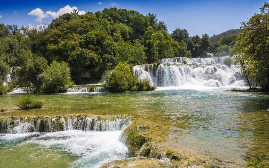 Krka National Park Waterfalls Group Tour from Split - Skradin: marina views, swimming option, and optional wine tasting