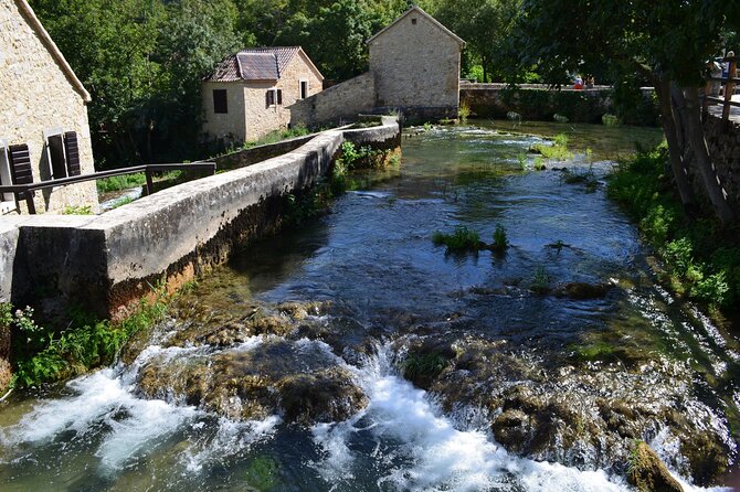 Krka Waterfalls National Park Boat Tour from Vodice - Fresh mussels on board: the Dalmatian snack that drives repeat joy