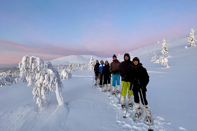 Levi: Snowshoeing adventure in the National Park - Lunch by the campfire hut: sausages, snacks, and spring-water coffee