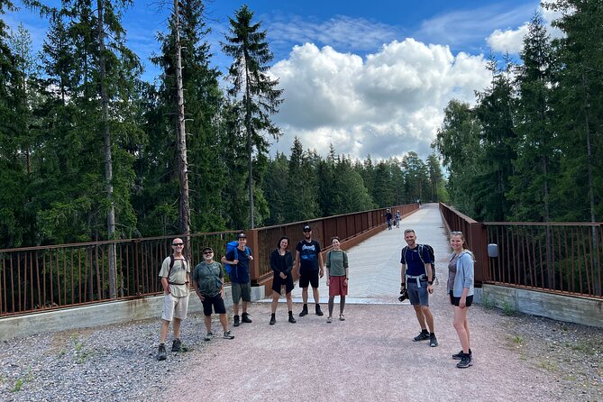 National Park Hike & Finnish Smoke Sauna Experience with Campfire Lunch - A 6 km national park hike with hills, steep steps, and foraging talk