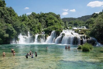 National Park Krka Private Return Day Transfer by Minivan - The Skradin boat ride: a scenic start before the falls