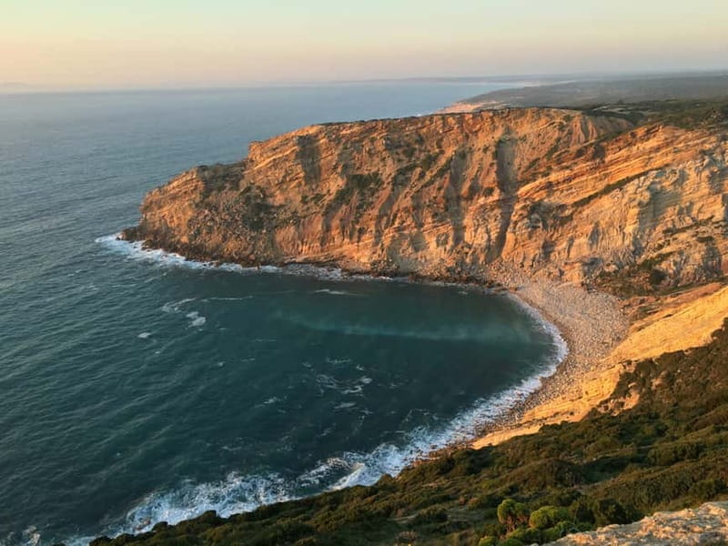 Sesimbra & Arrábida National Park Tour with 5 Wines Tasting - Leaving Lisbon: Salazar Bridge, the Christ the King statue, and the road south