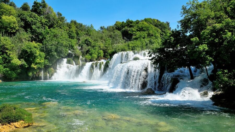 Split: Krka National Park Day Trip with Boat Ride & Swimming - Skradin Beach Time: Swimming, Stony Shore Tips, and a Nice Town Break