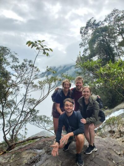 TOUR TREKKING HUE - BACH MA NATIONAL PARK DAILY - Getting to the summit: peace bell, cloud sky, and 1,450m views