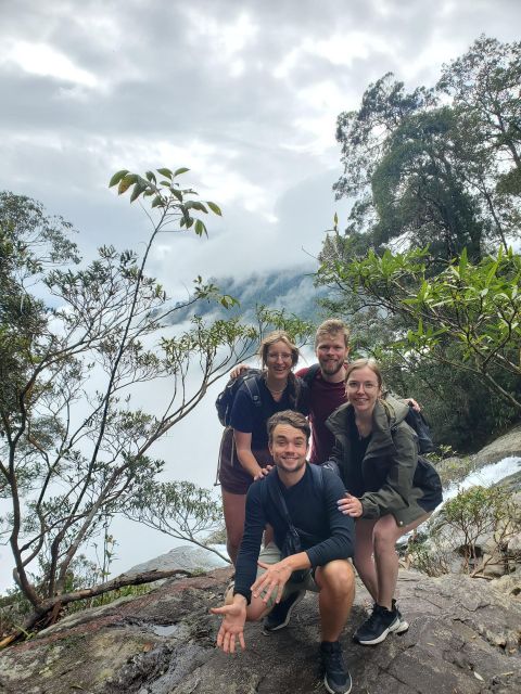 TOUR TREKKING HUE - BACH MA NATIONAL PARK DAILY - Getting to the summit: peace bell, cloud sky, and 1,450m views