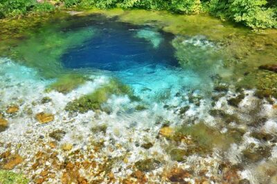 Visit The National Park of Blue Eye & Lekuresi castel - Stop 1: Blue Eye (Syri i Kaltër) and the 18-spring forest that fools your senses